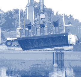 Figure 3. Mixing devices for roto-tiller delivery of AC into Grasse River sediment were mounted inside an enclosure to minimize re-suspension of sediment.