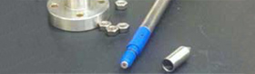 Acoustic probe tip and microphone embedded in the Delrin&reg; isolator.